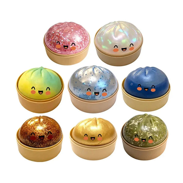 A collection of six colorful simulation dumpling pressure balls with varying iridescent and pastel finishes.
