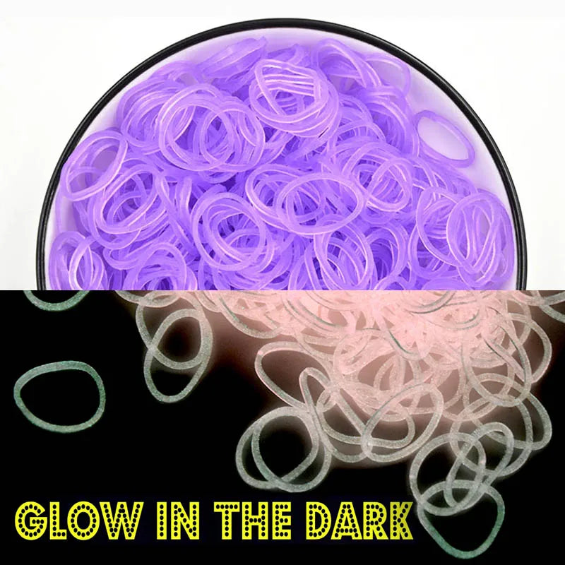 A close-up view of purple glow-in-the-dark plastic thread coils used for loom band bracelet making.