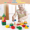 A child is playing with a wooden geometry puzzle set featuring various colored wooden shapes like triangles, cylinders, and c