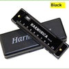 A black harmonica is shown with its protective case, displaying the hole numbers 1 through 10.