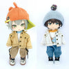 A 1/12 scale doll featuring an orange hat and a tan denim jacket with blue jeans.