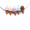 A collection of colorful DIY sunflower charms in pink, yellow, purple, and blue on ice cream cone shapes.