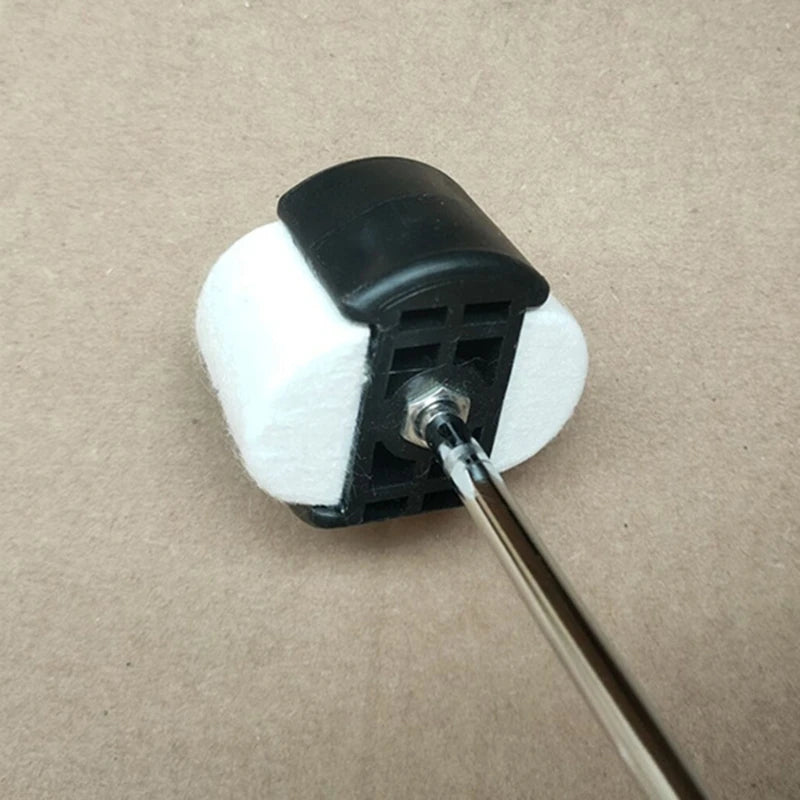 A black dual-sided bass drum pedal beater with white felt and rubber heads mounted on a metal rod.