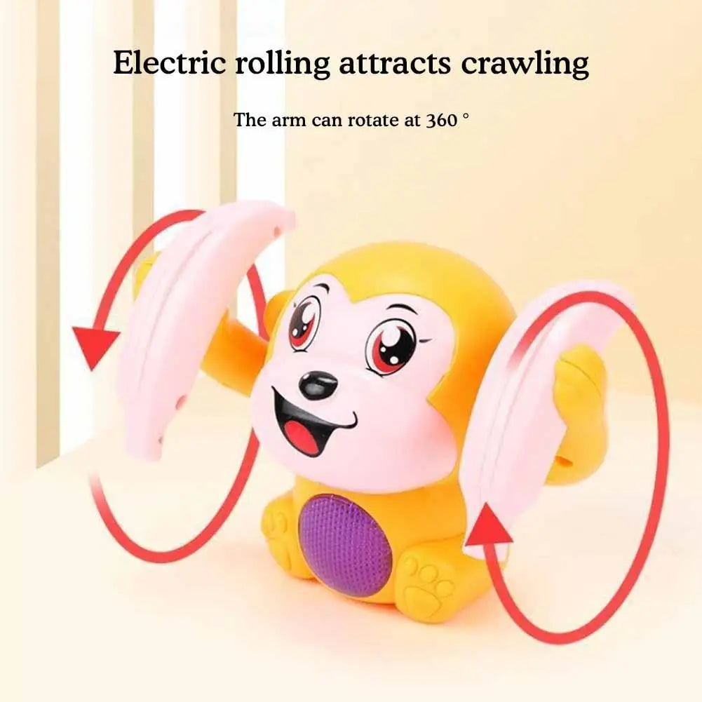A yellow and pink interactive rolling monkey toy demonstrating a 360-degree arm rotation.