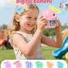 A smiling girl holds a pink multifunctional kids digital camera capable of printing photos, video, music, puzzles, and games.