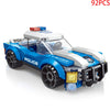 A blue police vehicle building block set with a white roof and emergency lights.