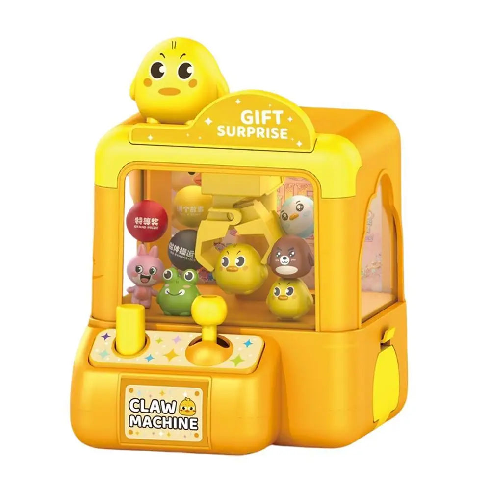 A yellow mini claw machine toy for kids featuring a clear display and several small yellow and brown plush toys.