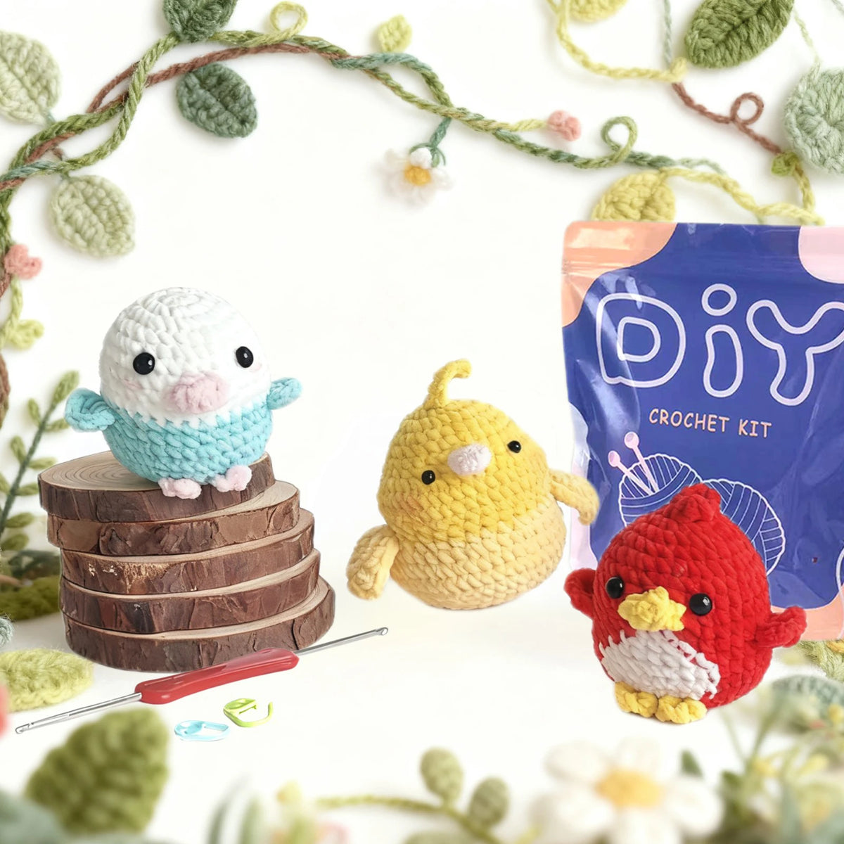 A DIY crochet kit featuring three finished bird amigurumi toys: a white and blue bird, a yellow bird, and a red bird.