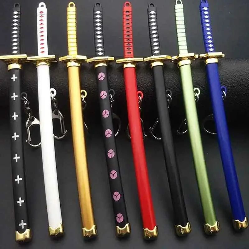 A collection of samurai swords with gold, white, black, red, and blue hilts and scabbards.