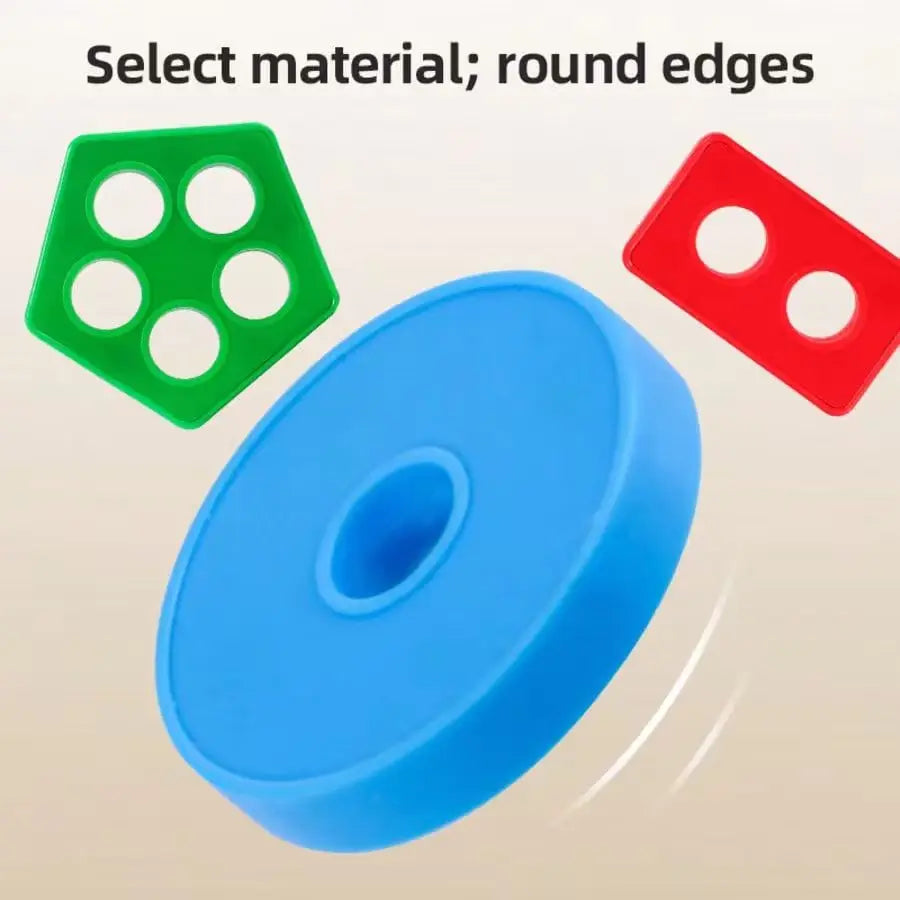 A set of colorful, round-edged plastic blocks in green, red, and blue shapes.