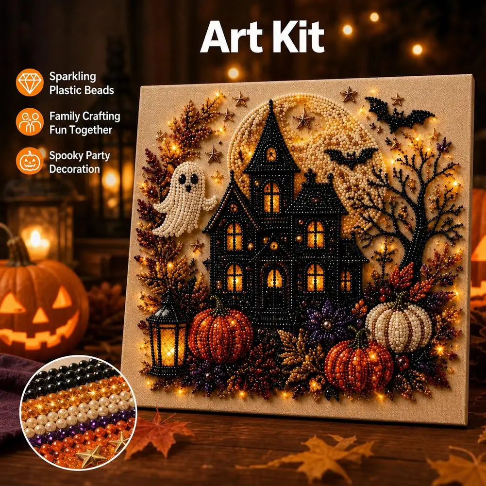 An art kit featuring a detailed Halloween ghost house painted with sparkling plastic beads and glitter.
