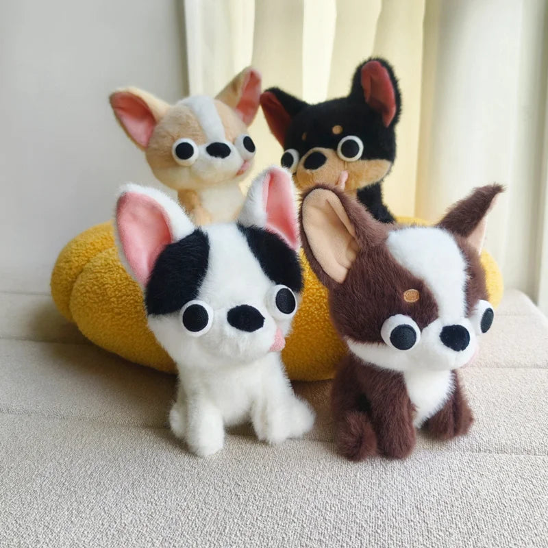 A collection of three chihuahua plush dolls with tongue out, featuring brown, black, and white fur.