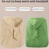 A beige baby windproof cape blanket with a dinosaur design shown in two colors, light green and beige.