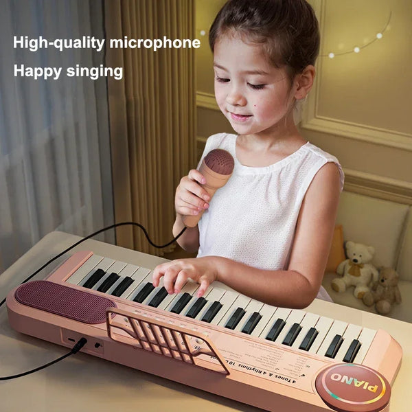 A young girl is playing a pink electric piano with a microphone and music kit.