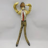 A plush doll resembling L Lawliet dressed in a suit and tie, posing with his arms raised.