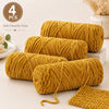 Four spools of golden yellow soft chenille yarn for crochet and knitting projects.