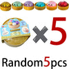 A set of five colorful glitter dumpling squishy stress relief toys in various shades and colors.