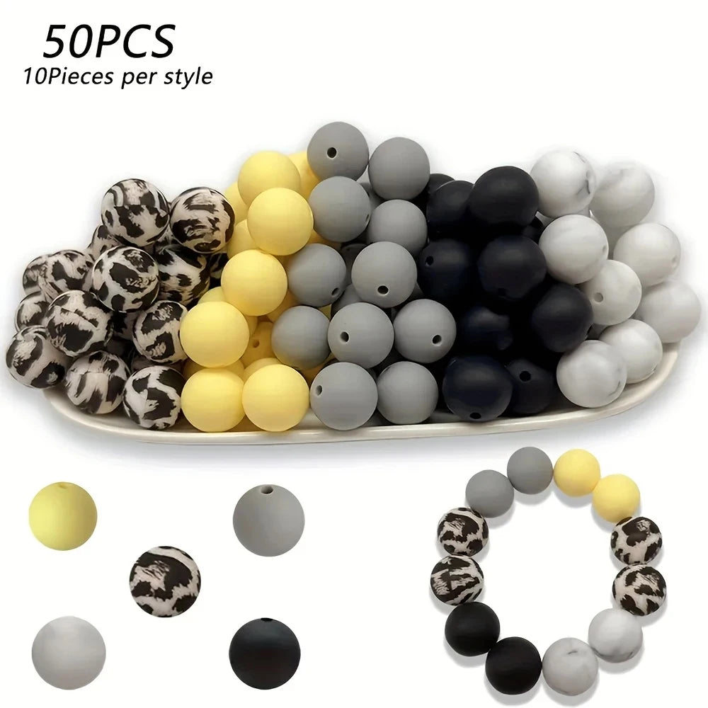 A collection of 50 silicone floral beads in various colors including black, white, yellow, and gray, shown in bulk and arrang
