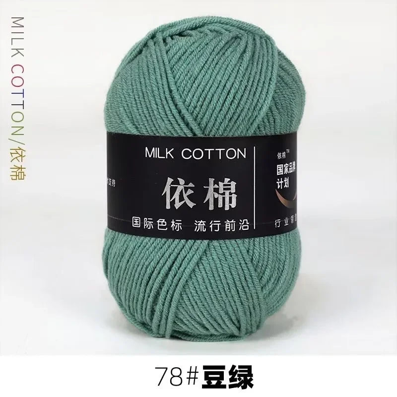 A ball of teal milk cotton yarn labeled with Chinese characters and the number 78
