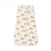 A cream-colored sleeveless baby sleeping bag with a repeating pattern of pastel rainbow motifs.