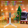 An LED acrylic message board displaying Christmas and holiday themed designs, including a tree, gifts, and festive text.