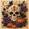 A detailed art kit featuring a skull and pumpkin design made with 3D pearls and foliage for Halloween decor
