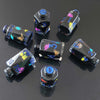 A set of seven floral resin potion bottles shaped like polyhedral dice, featuring various numbers and designs.
