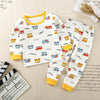 A white long sleeve two-piece cotton pajama set featuring colorful cartoon vehicles and characters for kids