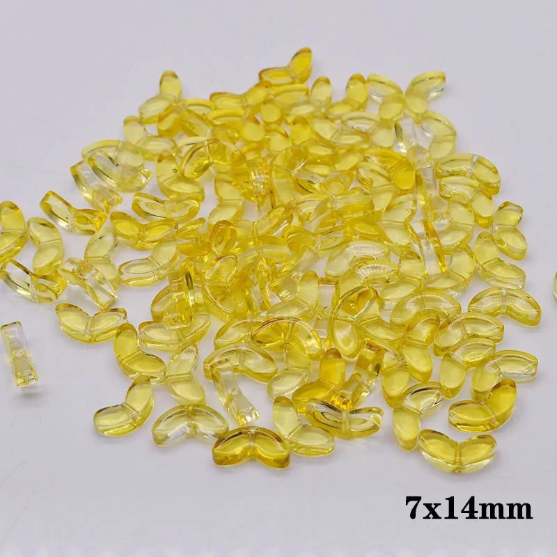 A pile of yellow glass beads shaped like tulip flowers, measuring 7x14mm.