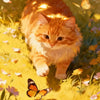 An orange tabby kitten is standing in a sunny yellow field surrounded by yellow and pink wildflowers, with butterflies flutte