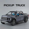 A gray 1:20 scale Ford Raptor F150 diecast model truck is shown in a studio setting.