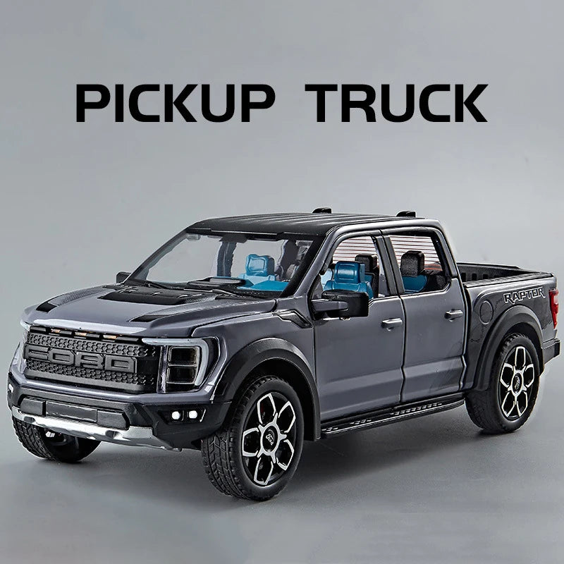 A gray 1:20 scale Ford Raptor F150 diecast model truck is shown in a studio setting.