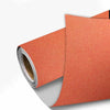 Rolls of orange linen book binding cloth used for albums and scrapbooks