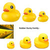 A set of rubber duckies in various sizes, ranging from small to large yellow ducks.