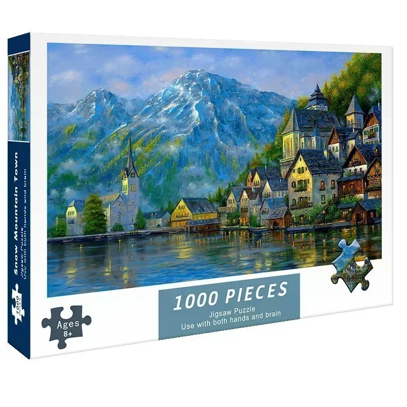 A jigsaw puzzle depicting a scenic mountain landscape with a medieval town and water.