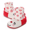 Pair of adorable animal-themed baby first walker shoes in red and white with snowflake patterns