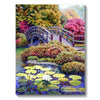 A diamond painting depicts a lush forest landscape featuring a wooden bridge over water and colorful foliage.
