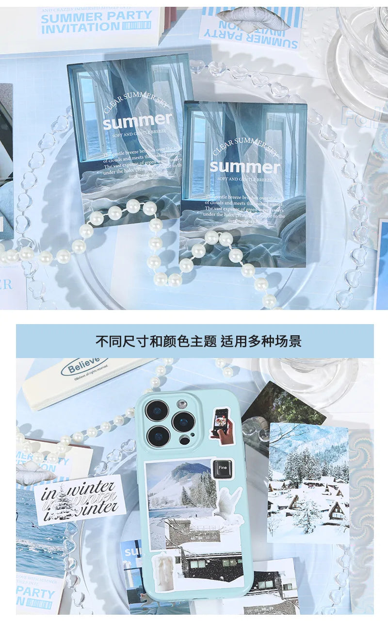 A phone displaying a collage of winter and summer scenery stickers, surrounded by various seasonal imagery.