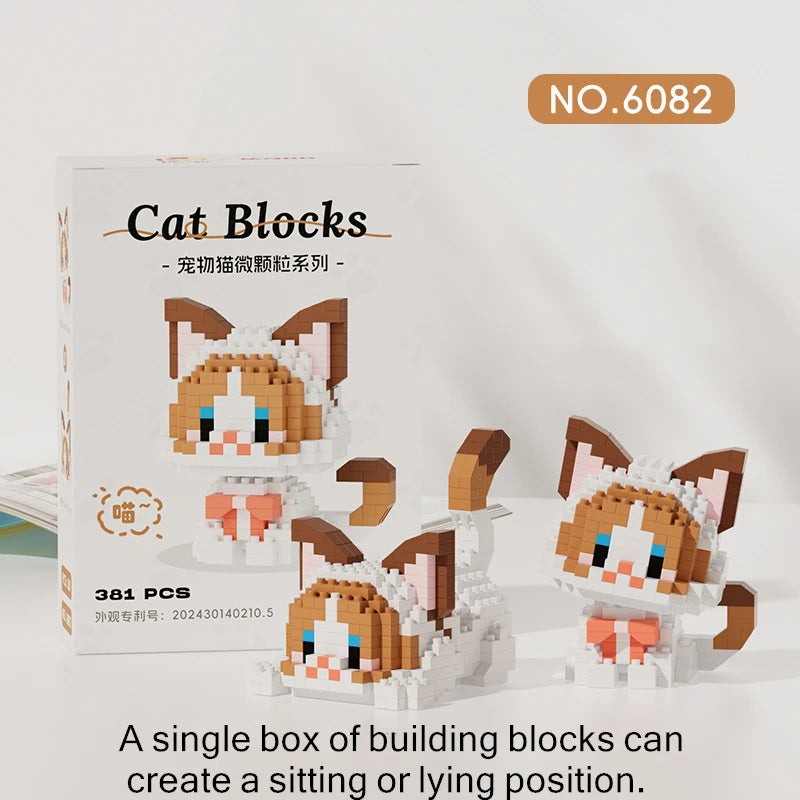 A box of Cat Blocks building blocks featuring a cat figure and various pieces for creating sitting or lying positions.
