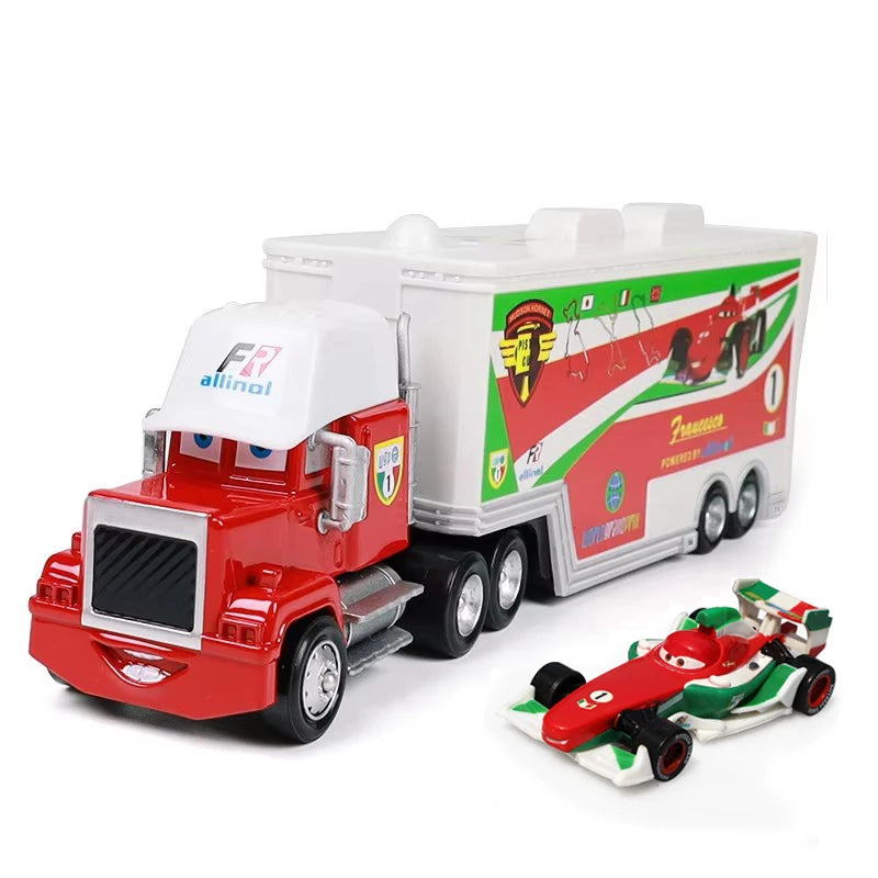A red diecast toy hauler truck with a white trailer and various accessories.