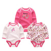 A pink cotton baby bodysuit 3-pack with long sleeves featuring a 'Mommy's Little Star!' design.