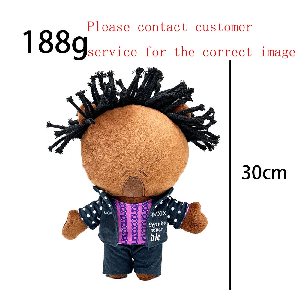 Brown plush doll with black hair and a dark blue jacket and pants.