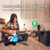 A woman plays an acoustic guitar while using an A8 wireless guitar transmitter and receiver system.