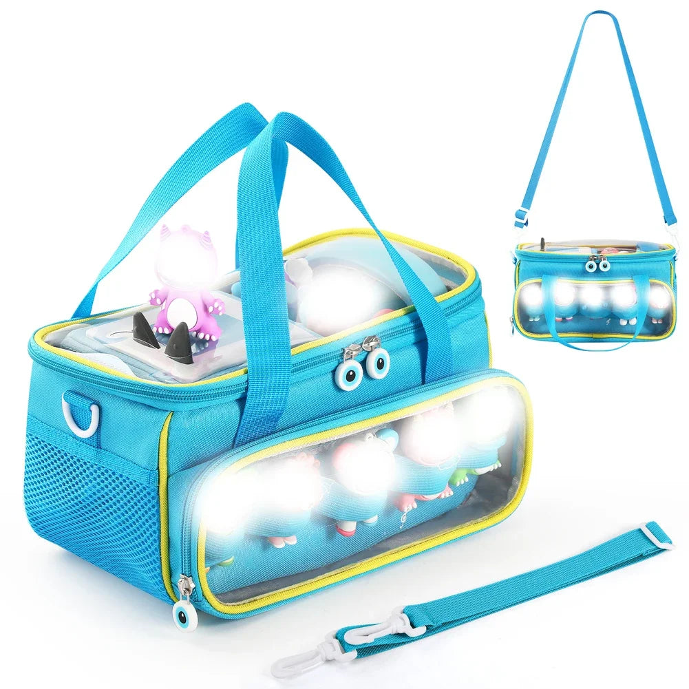 A blue Toniebox travel case with an adjustable strap and a clear window showing toys inside.