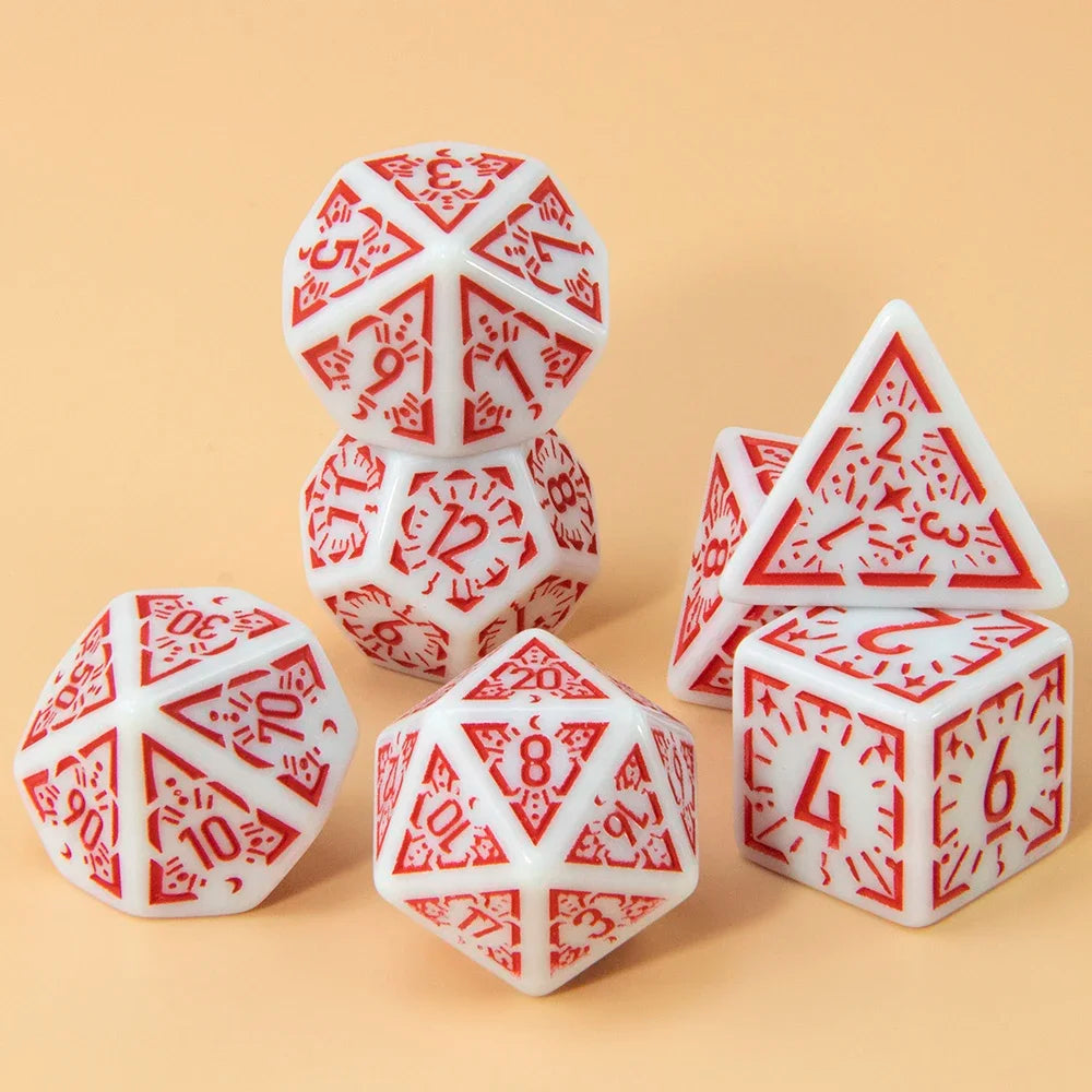 A set of seven polyhedral dice in white and red are arranged on a light beige surface.