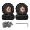 Four 1.3 inch aluminum RC crawler wheels with tires and a set of metal rods for off-road rigs