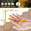 A hand holds a yellow natural beeswax taper candle, showing its 7-inch length and 0.23 inch diameter.
