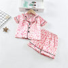 A pink leopard print toddler pajama set featuring a short-sleeved top and matching pants.
