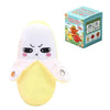 A yellow fruit-sensing plush toy with pink accents and a green box showing various fruits.