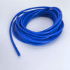 A coil of blue flexible silicone tinned copper wire with multiple AWG gauges lying on a white surface.